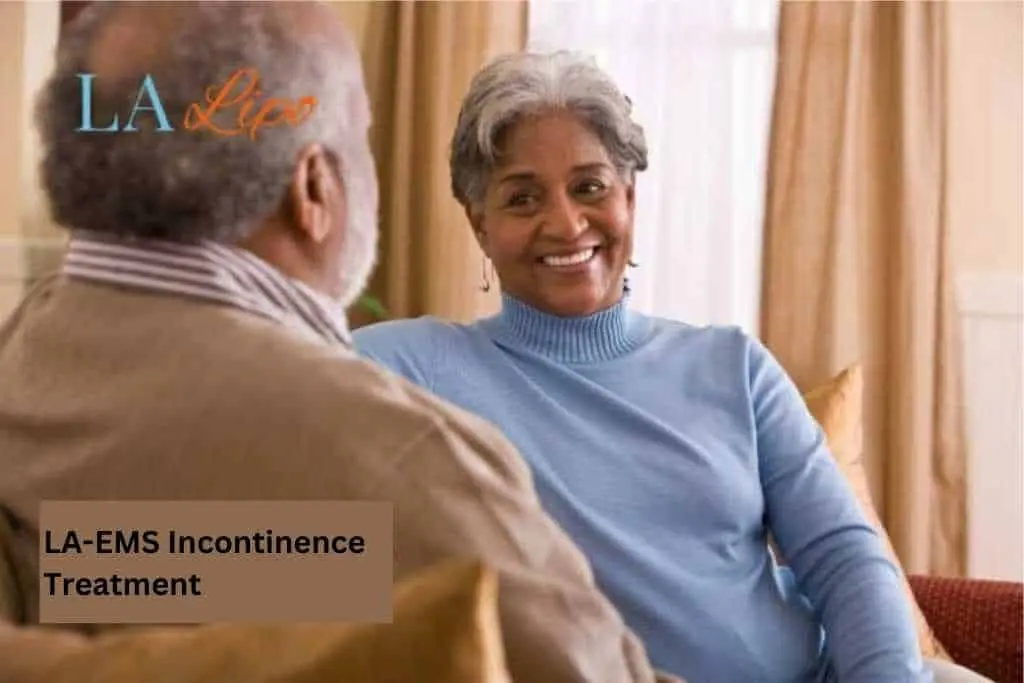 Couple sat smiling at each other - LA-EMS treatment Teddington