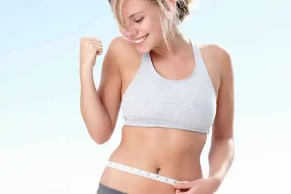 woman happy after fat reduction treatment Teddington